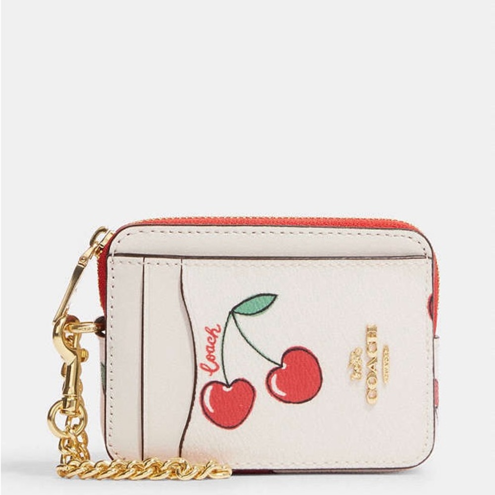 ISO cherry heart print coach zip card case.